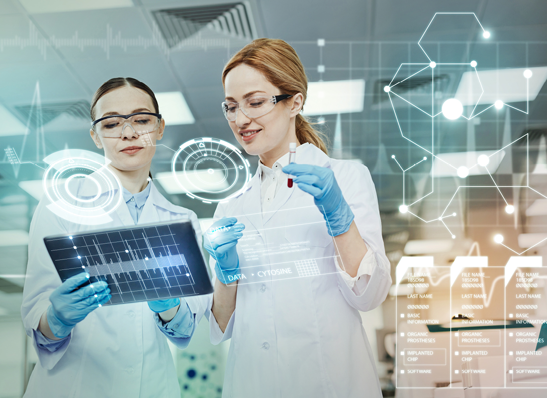 Two female laboratory professionals look at a tablet device in the lab as graph and chart-related graphics swirl around them, illustrating a medical AI concept.